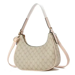 Hobo-Tasche mit Retro-Monogramm aus beigem Canvas mit rosa Lederbesatz und Trägern