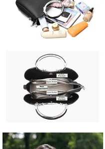 Macro view of interior compartments and silver metal handle of the black leather bag