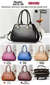 Detailed view of crocodile pattern handbag showing interior compartments and 29x21x13cm size