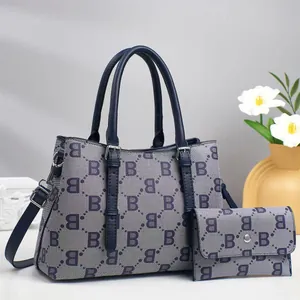Fashionable navy blue tote bag and wallet set with repeating star patterns for women