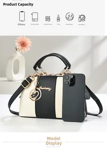 Détail montrant la grande capacité d'un sac cabas pour téléphone et maquillage