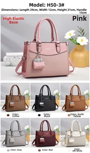 Detailed view of the 29x12x21cm dimensions for this elegant textured leather tote bag