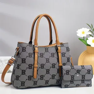 Chic grey canvas tote bag and wallet set with brown leather trim and letter B pattern