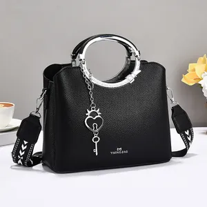 2025 New Women Fashion PU Leather Handbag Large Capacity Crossbody Bag With Round Metal Handle Heart Pendant Lychee Texture