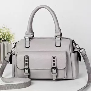 Gray lychee textured Boston bag with top handles and detachable wide woven shoulder strap