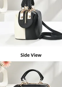 Vue latérale du sac fourre-tout bicolore avec texture litchi et détails dorés