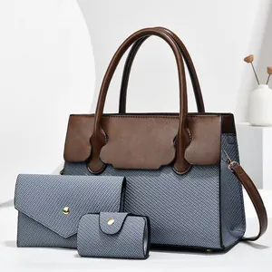 Three-piece set women's handbag in blue fabric and brown leather with shoulder strap
