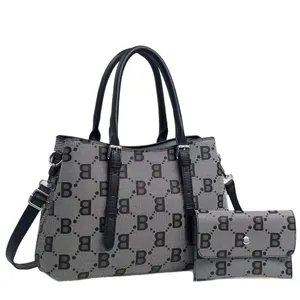 Chic two-piece tote bag and wallet set featuring grey jacquard B-pattern and black straps