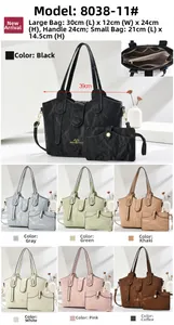 Detailed views of textured tote and pouch set with internal structure and color options