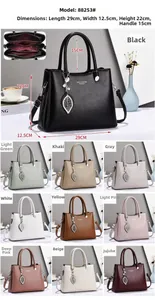 Detailed view of women's lychee texture handbag with dimensions and 10 color options
