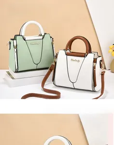 Close-up of contrast color tote bags with metal hardware and Danbaoly logo