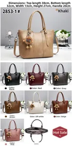 Detailed interior view of multi-compartment leather tote bag with precise dimensions