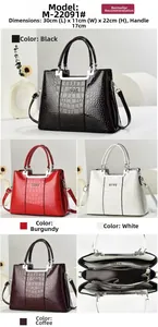Detail of crocodile embossed leather tote bag showing four colors and internal compartments