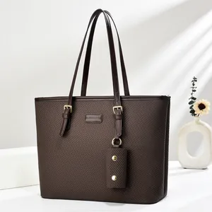 Brown woven texture tote bag for women with gold hardware and small accessory pouch