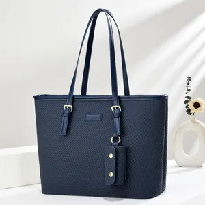 Large dark blue textured PU leather tote bag with a small matching coin purse