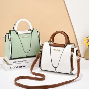 Fashionable large capacity contrast color tote bags in green and white with gold hardware