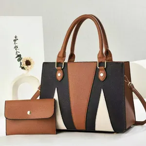 Minimalist color-block tote bag with matching wallet in brown, black, and beige synthetic leather