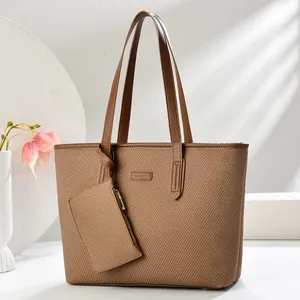 Brown woven tote bag two-piece set with fashion tag on minimalist elegant display