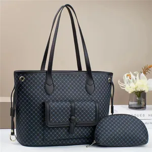 Large tote bag with blue geometric pattern and matching coin purse set for women