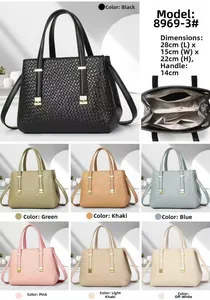 Close-up of the woven texture and size details for this large capacity handbag