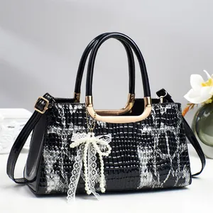 Sac à main pour femme en cuir verni à motif animal avec poignées dorées et perle