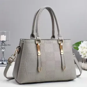 Elegant grey embossed handbag with gold hardware and detachable shoulder strap for women