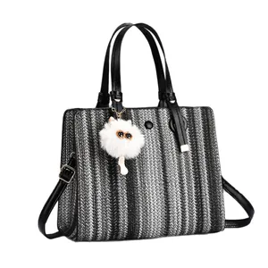 2025 trendy black and grey striped woven tote bag with cute white cat plush charm