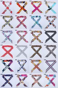 Detailed grid showing 24 diverse pattern designs of slim satin silk scarves and bag ribbons