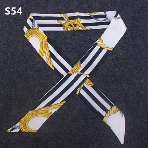 Detail of nautical style silk twilly S54 featuring black white stripes and gold anchors