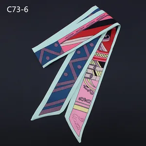 Multicolor geometric twilly silk scarf featuring classical patterns and sleek satin finish