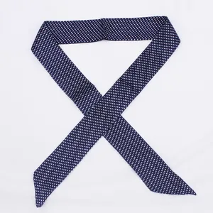 Detail of S71 navy blue polka dot silk scarf for handbags with diagonal cut ends