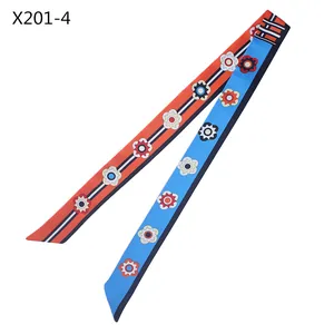Detail of 120cm twilly scarf with floral patterns and striped edges in orange and blue