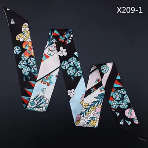 Close-up of a 120cm floral silk scarf with colorful flower and butterfly patterns