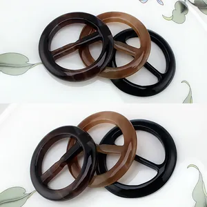 Three-color resin scarf rings set in black, tortoise shell, and light brown finishes