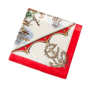 Detail view of square silk scarf with nautical sailing ship prints and satin red border