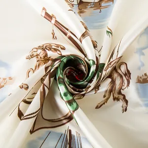 Macro shot of silk scarf fabric showing smooth texture and nautical sailing boat patterns