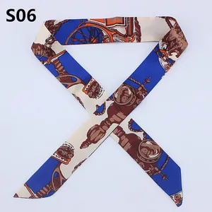 Slim silk twilly scarf with blue and beige vintage carriage pattern for bag handles