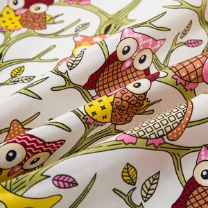 Detail shot of 90cm silk-like scarf showing smooth texture and owl patterns