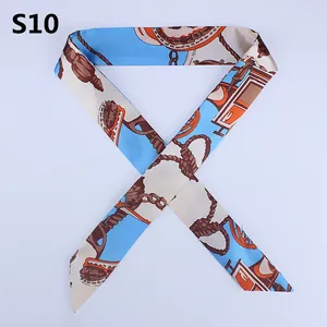 Light blue and beige skinny silk scarf with vintage carriage print for handbags