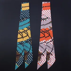 Polka dot equestrian silk twilly scarves with horse harness patterns on black background