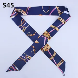 Navy blue twilly scarf with gold chain print and pink stripes for handbag handles