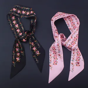 Floral print Twilly scarves in black and light pink silk-like fabric with small blossoms