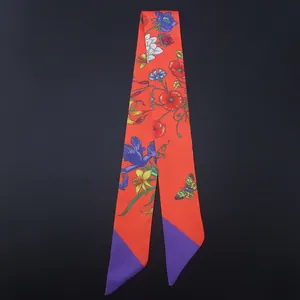 Red twilly silk scarf with colorful floral print and butterfly for handbag handles