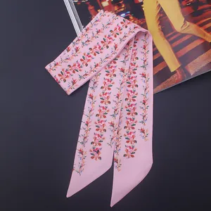 Pink floral print silk skinny scarf for neck or handbag wrap on minimalist black background