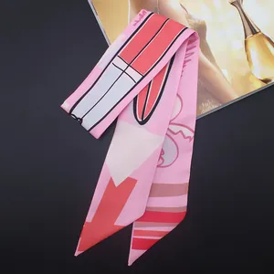 Pink satin skinny scarf with lipstick print for handbag handles and hair styling
