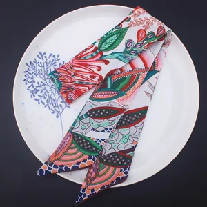 Bohemian floral satin skinny scarf twilly for handbags and hair styling on decor tray
