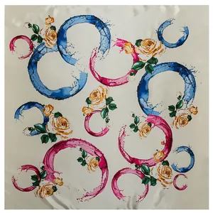 Square silk-like scarf featuring yellow roses and blue artistic circular patterns