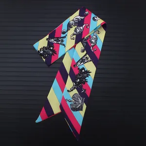 Silk twilly scarf with geometric diagonal stripes and baroque crown print on dark background