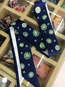 Extra-long 140cm navy blue silk twilly scarf with green clover and geometric patterns