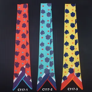 Three-piece set of cartoon floral striped silk scarves in vibrant orange, blue, and yellow